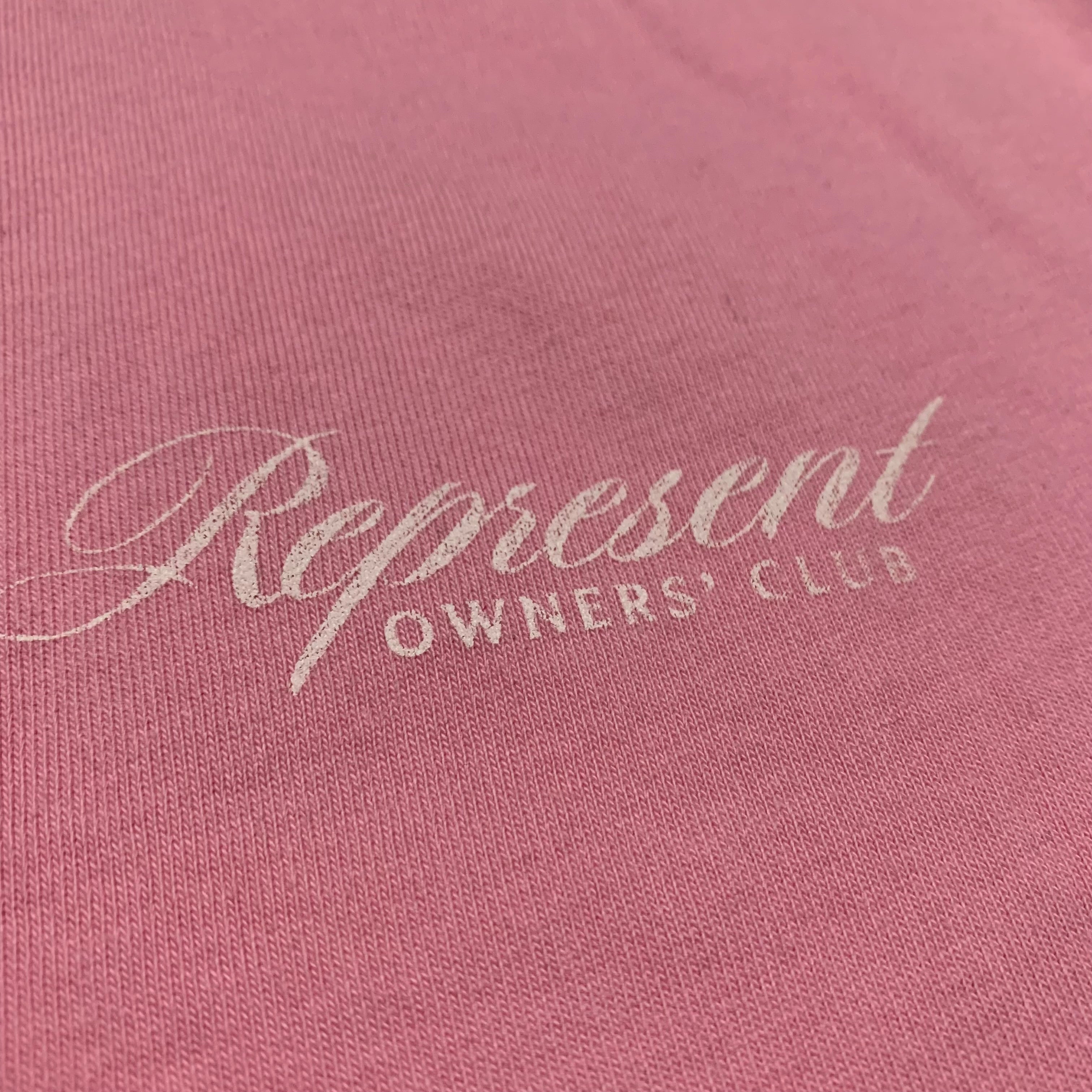 Represent XS Owners Club Script Pink Tee