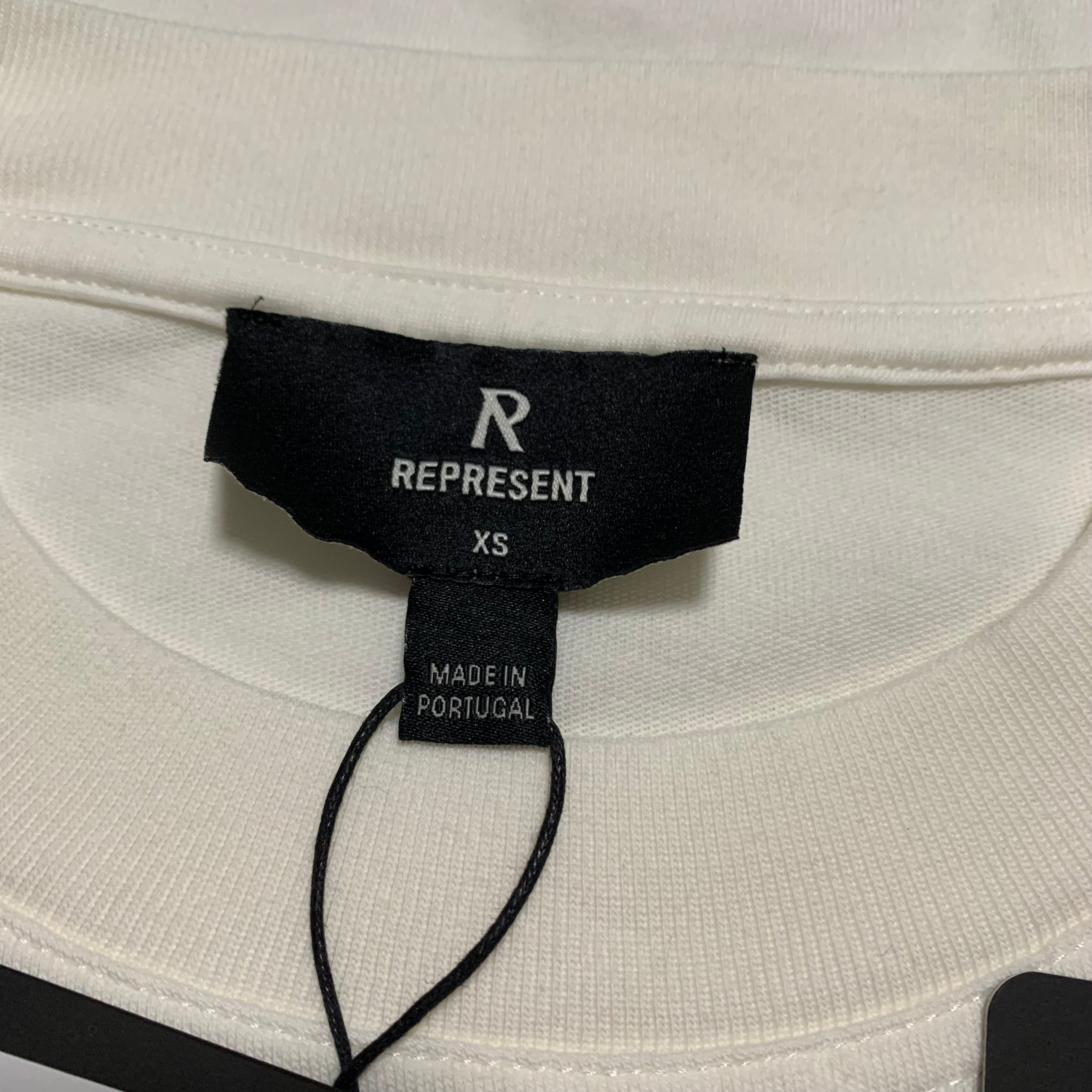 Represent XS Oasis Owners Club Flat White Tee