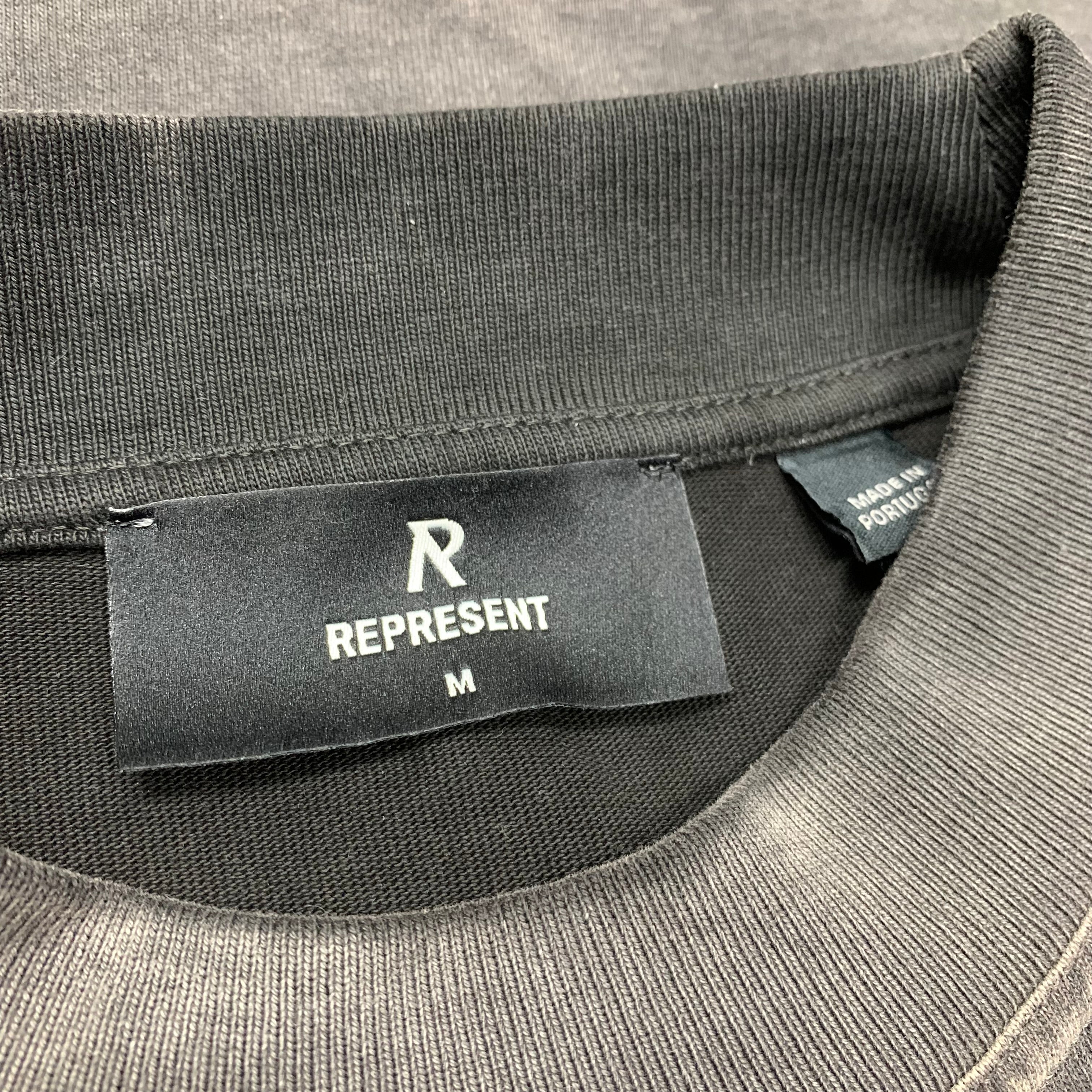 Represent Medium Tee Showcasing Stained Black T-Shirt