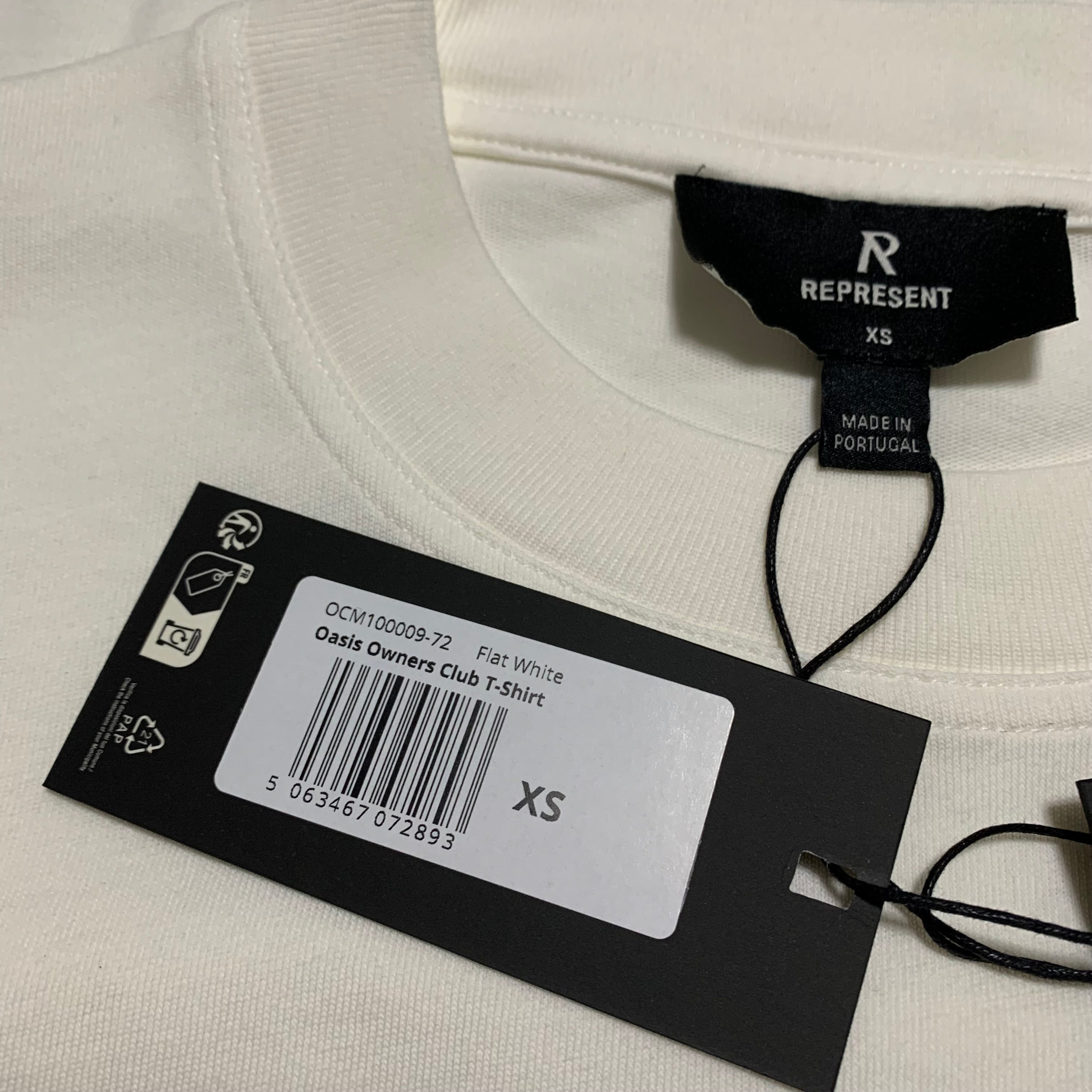 Represent XS Oasis Owners Club Flat White Tee