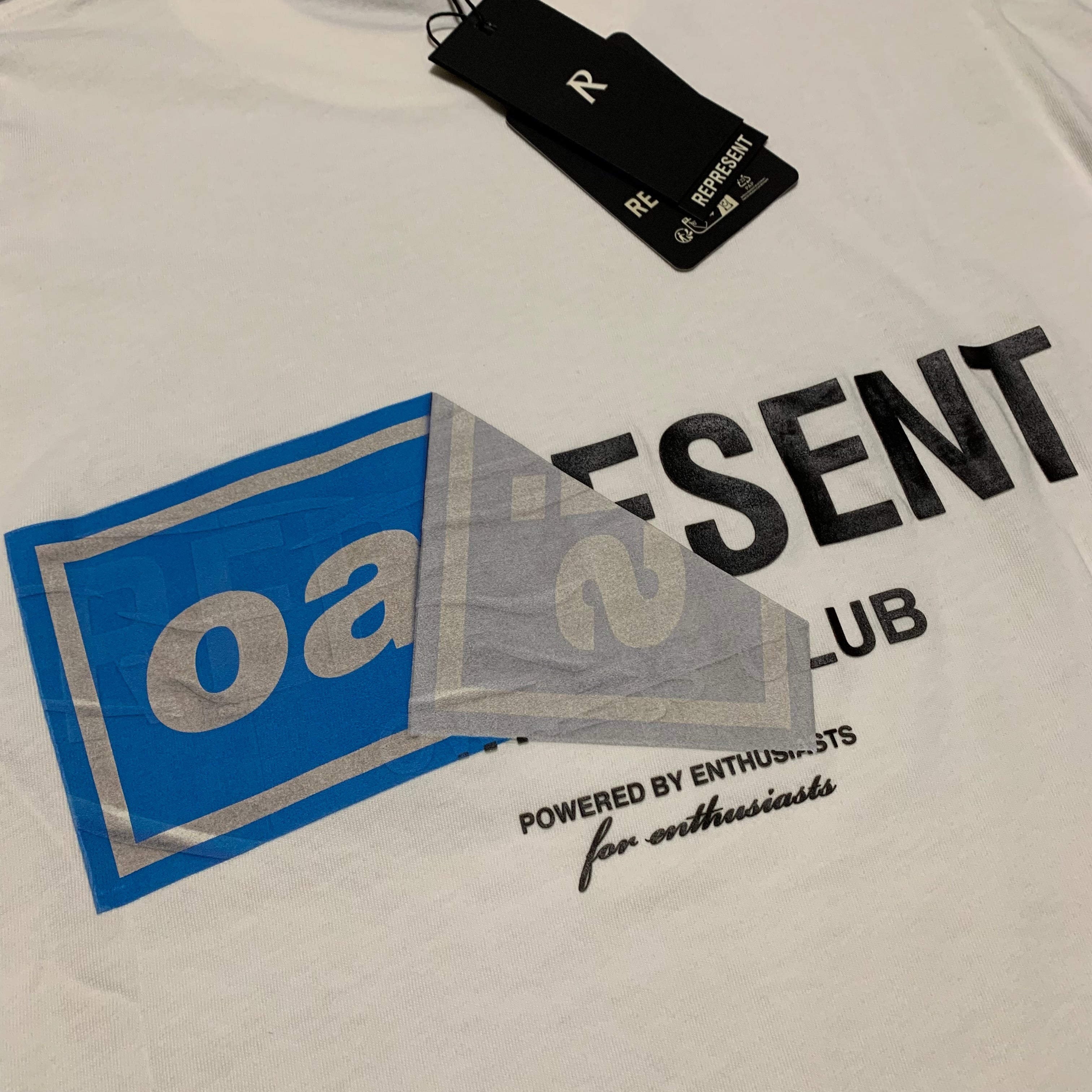 Represent XS Oasis Owners Club Flat White Tee