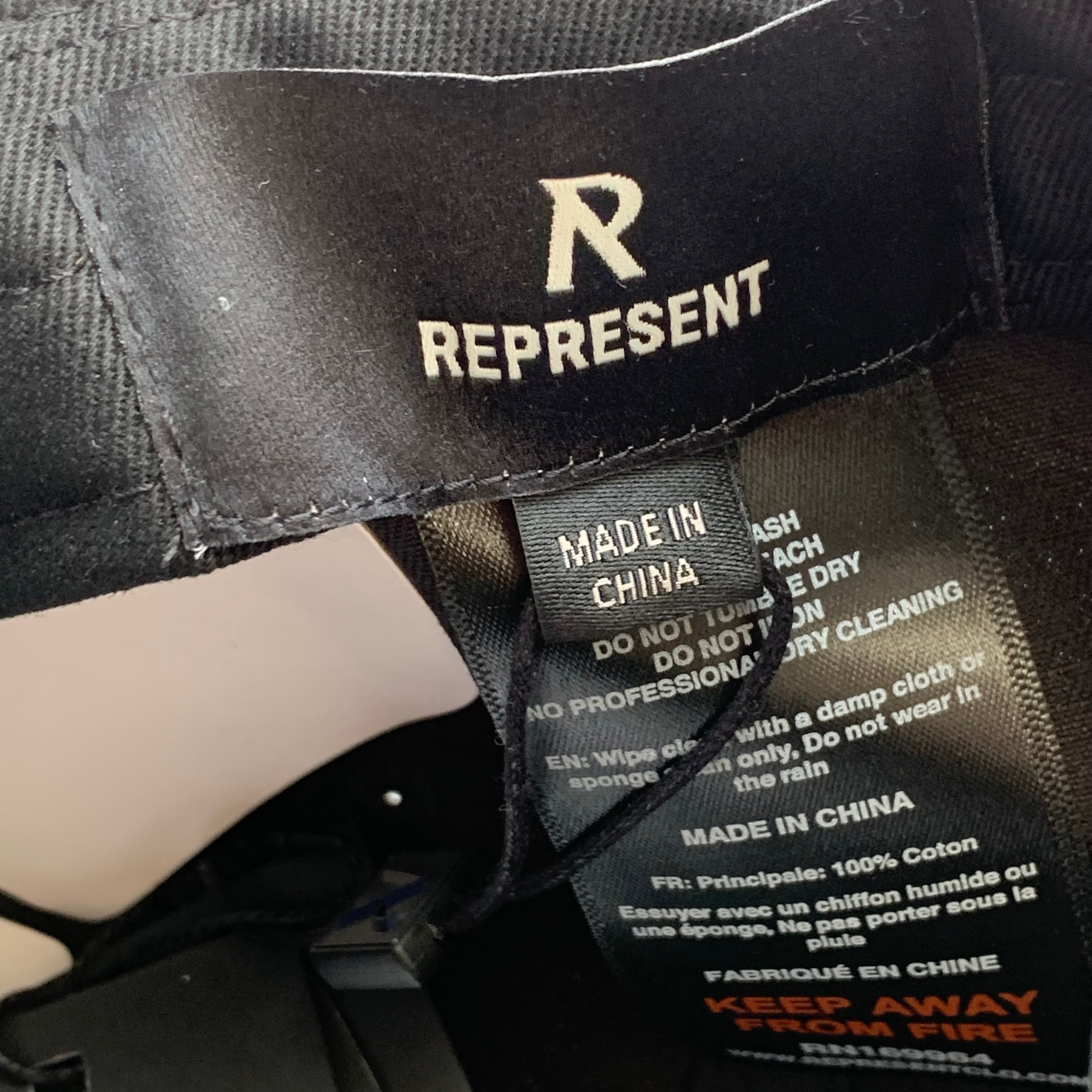 Represent Cap Showcasing Black Cap Hat