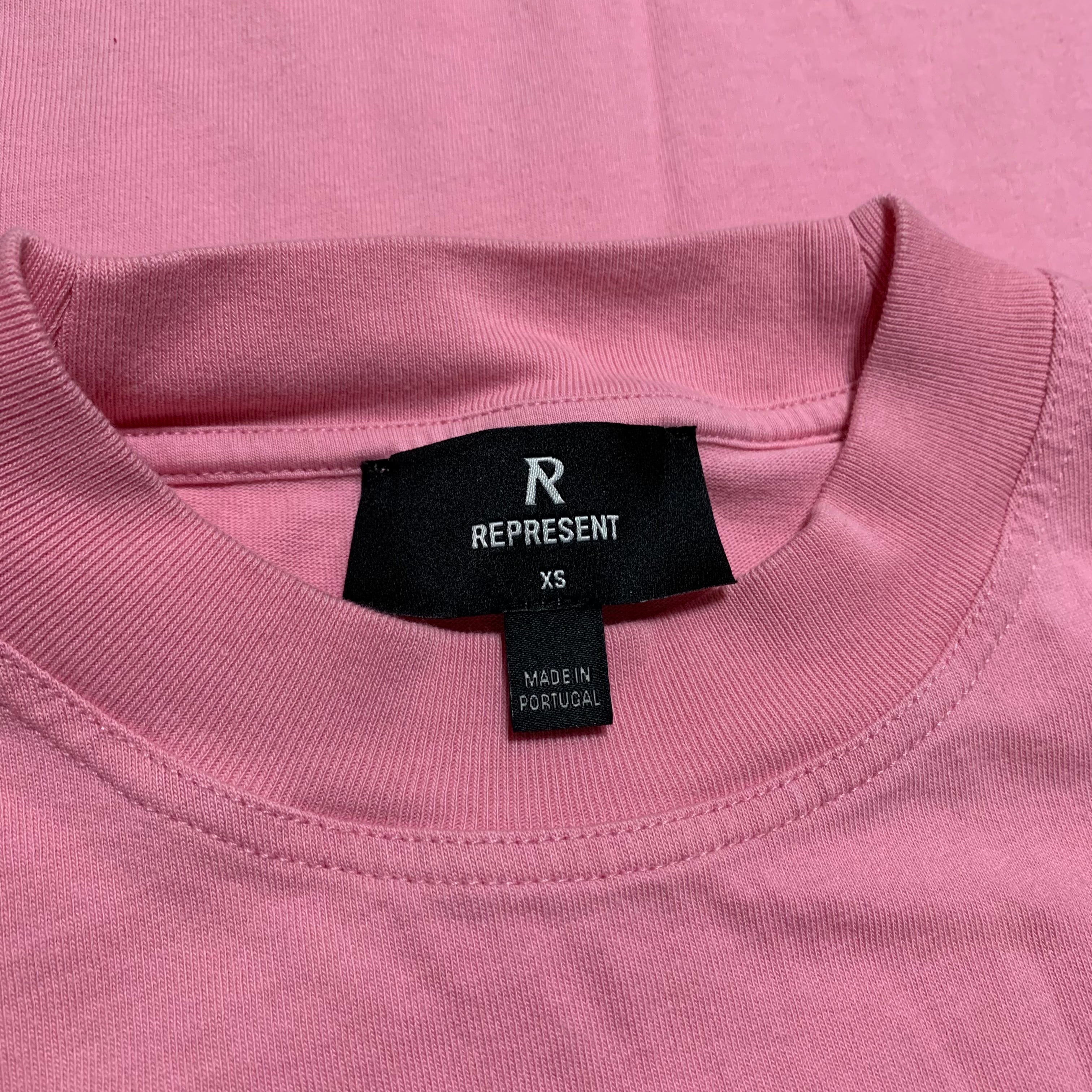 Represent XS Owners Club Script Pink Tee