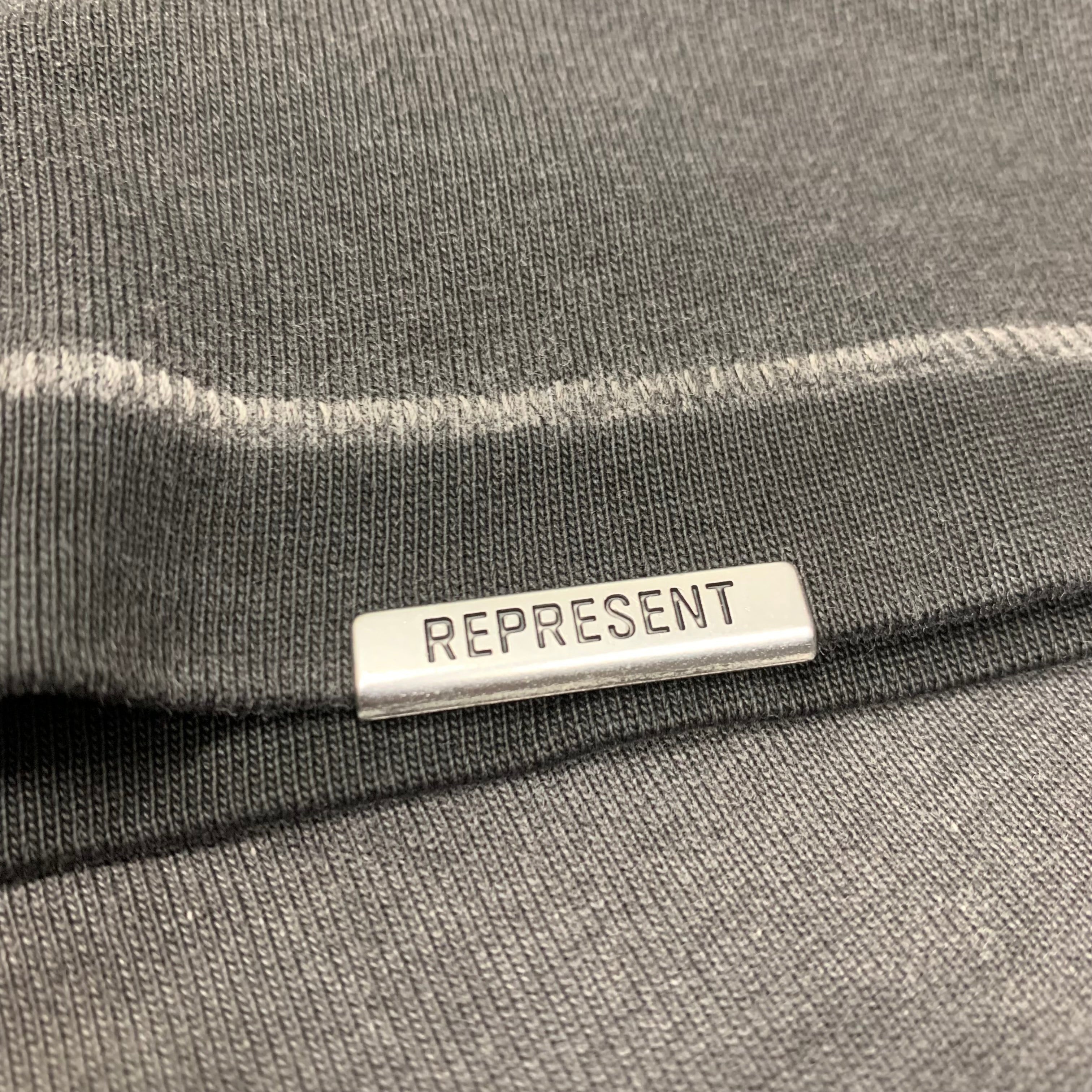 Represent Medium Tee Showcasing Stained Black T-Shirt