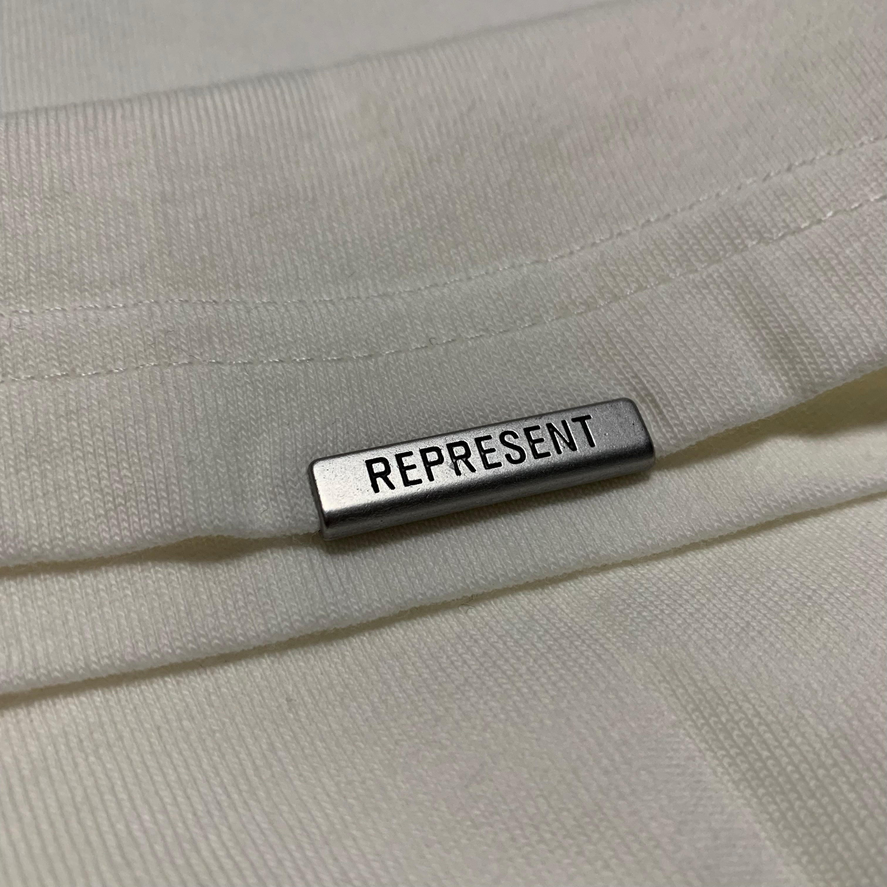 Represent XS Oasis Owners Club Flat White Tee