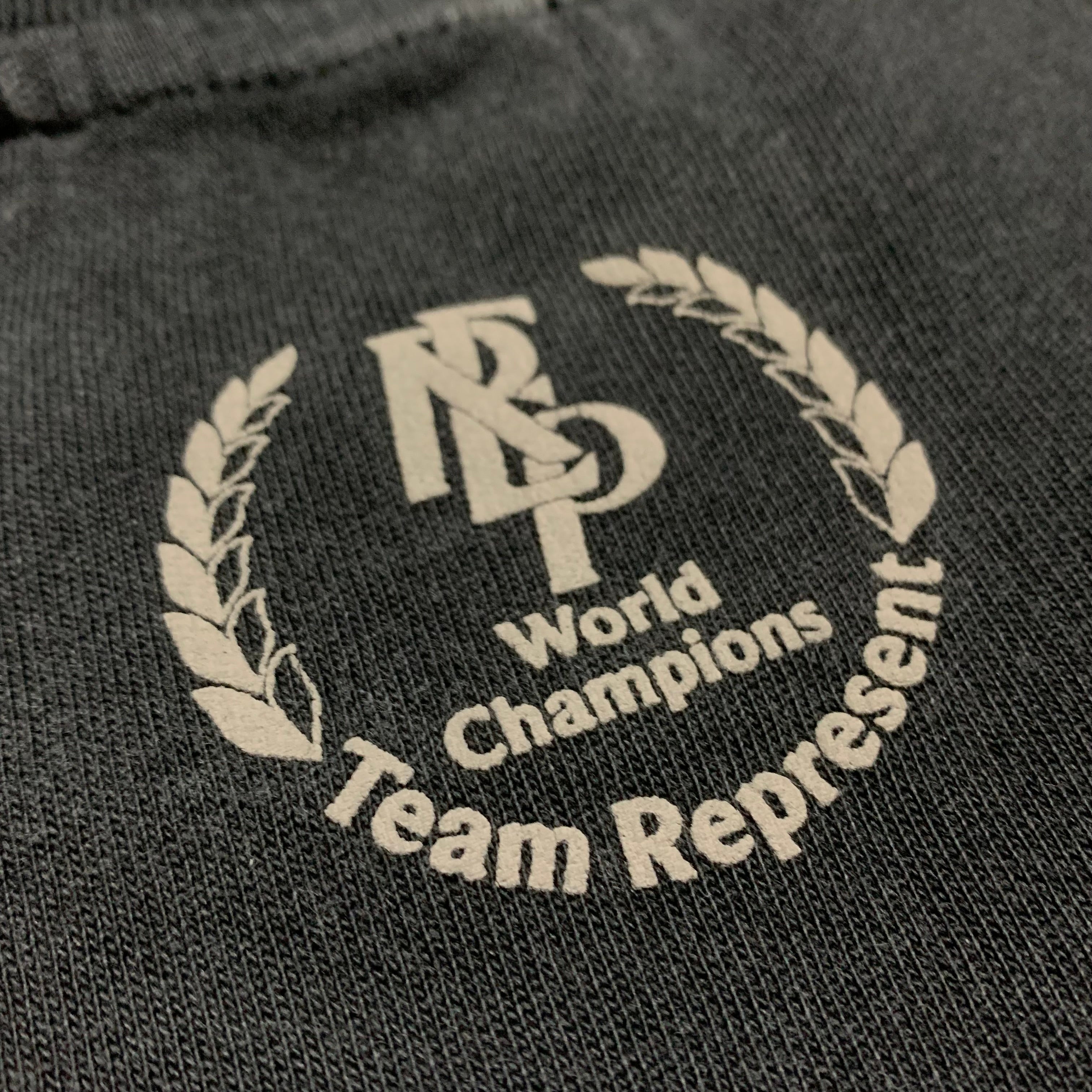 Represent XXS World Championship Stained Black Tee